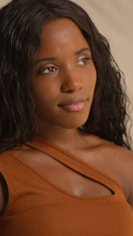 Studio-Portrait-Shot-Of-Young-Woman-Feeling-Softness-Of-Skin-After-Using-Beauty-Product-2